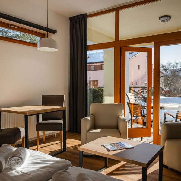 Obývací pokoj studiového apartmánu 2S1